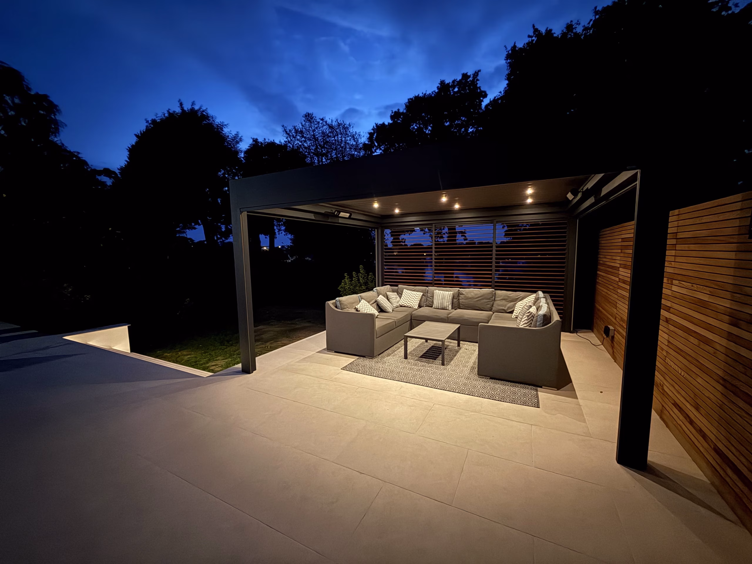 dimly light image of patio with chairs