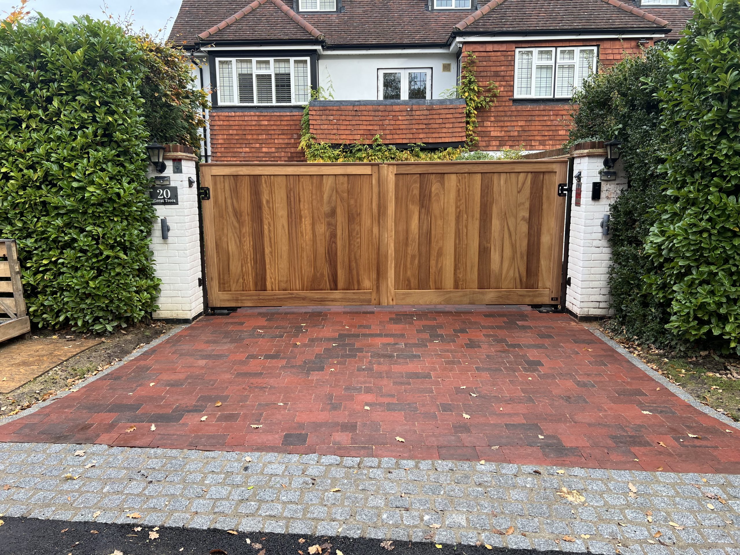 front gate red bricked patio