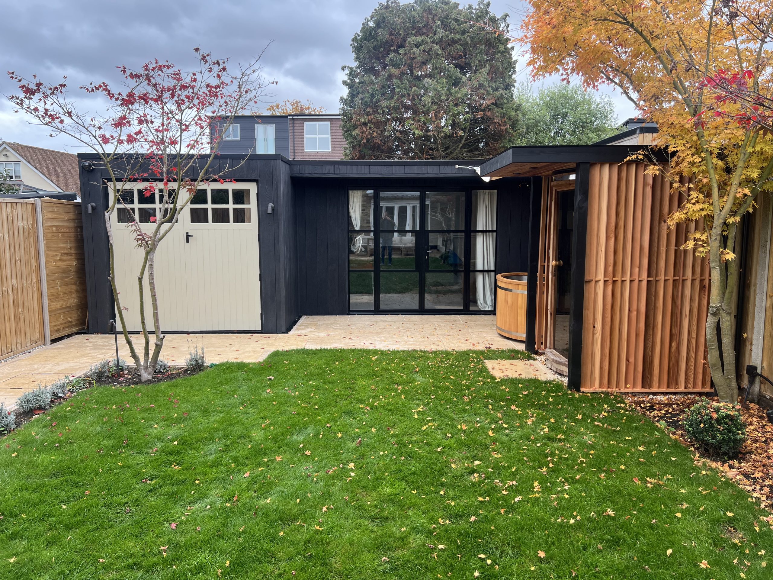 side view of outdoor sauna and cold plunge build